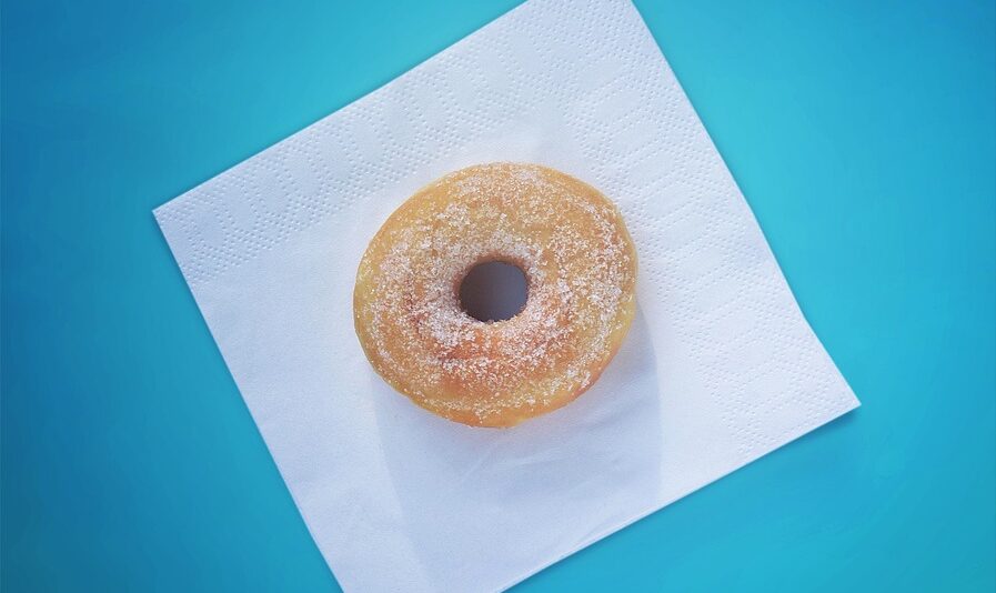 gluten free donut on blue table