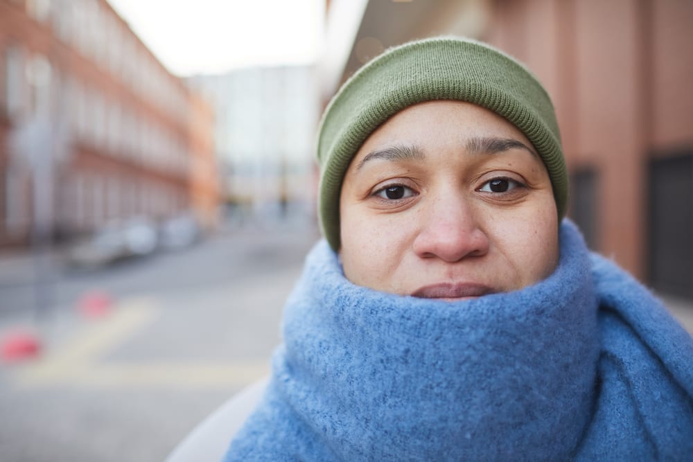 Woman In Cold Weather wearing scarf and hat