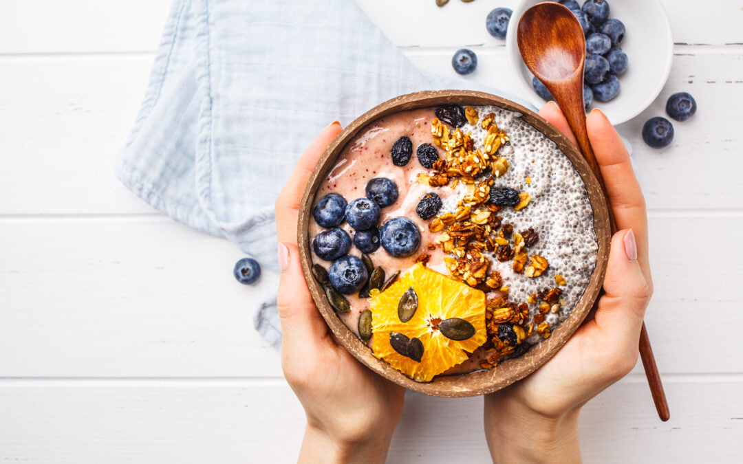 breakfast smoothie bowl with chia pudding, berries and granola i