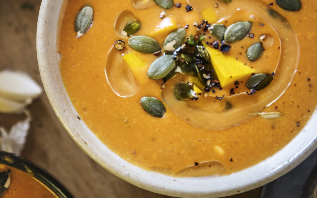 pumpkin soup with roasted pumpkin seeds on top