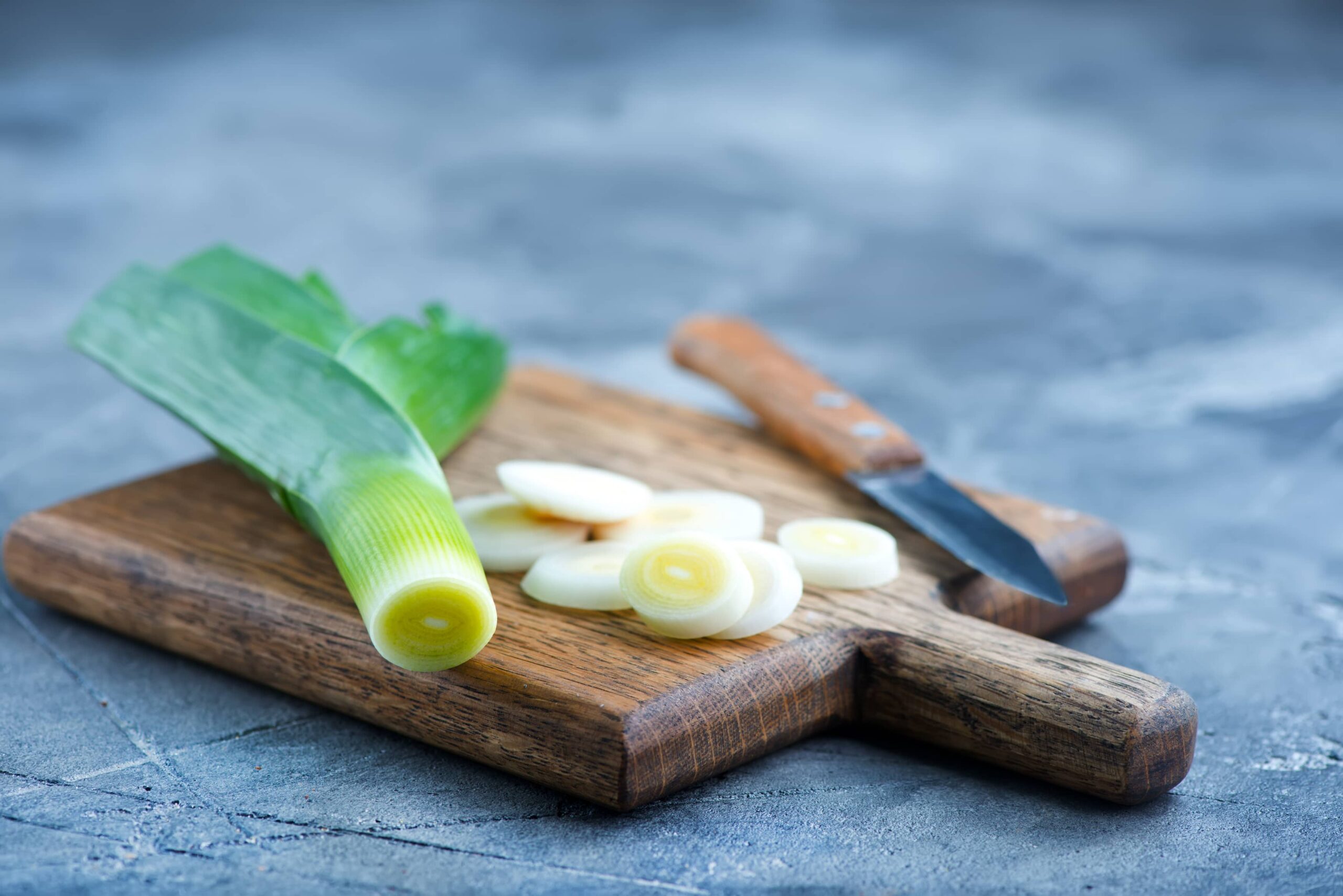 Leek sitting on a cutting board