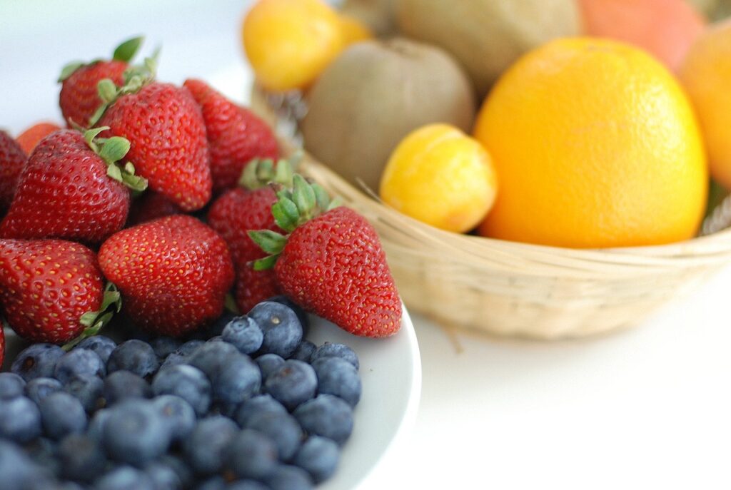 fruit high in vitamin c in bowls on table