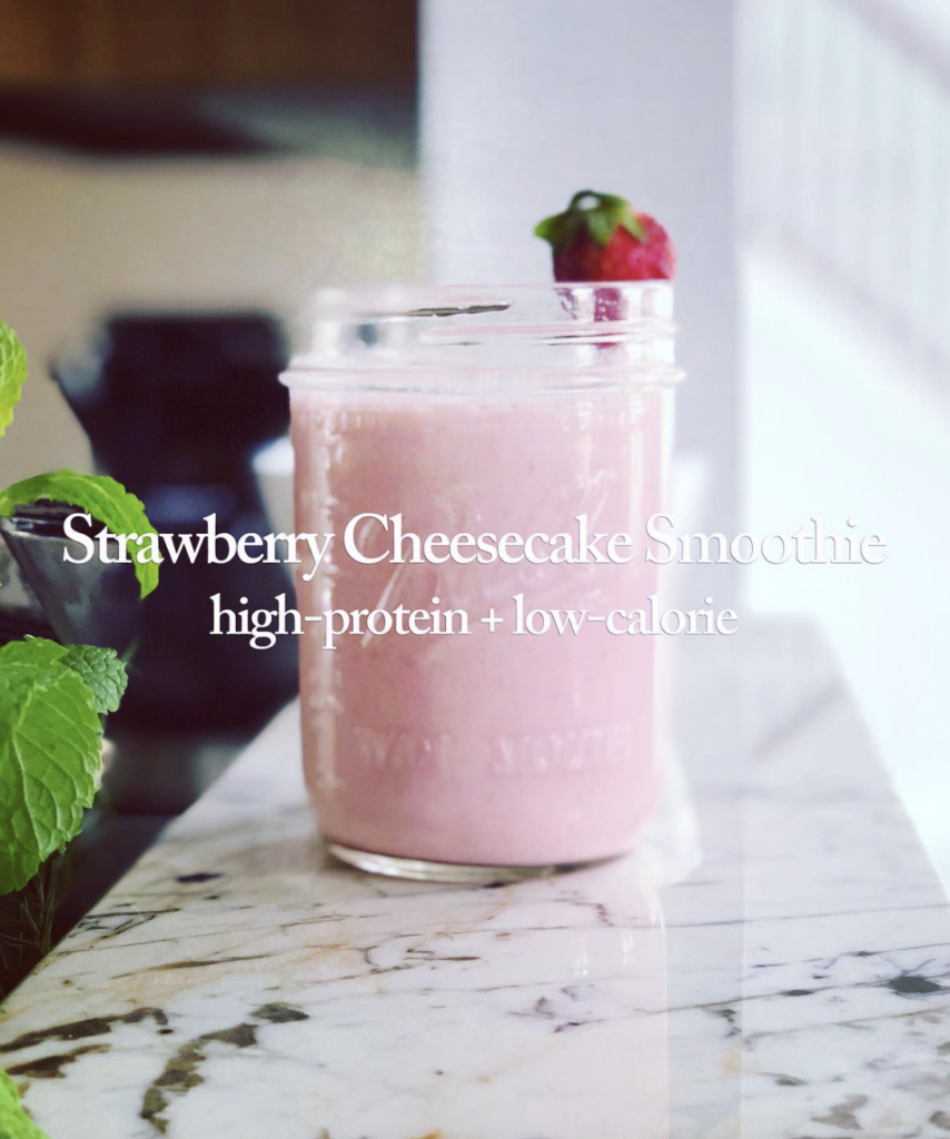 strawberry_cheescake_high_protein_shake_in_mason_jar_on_counter