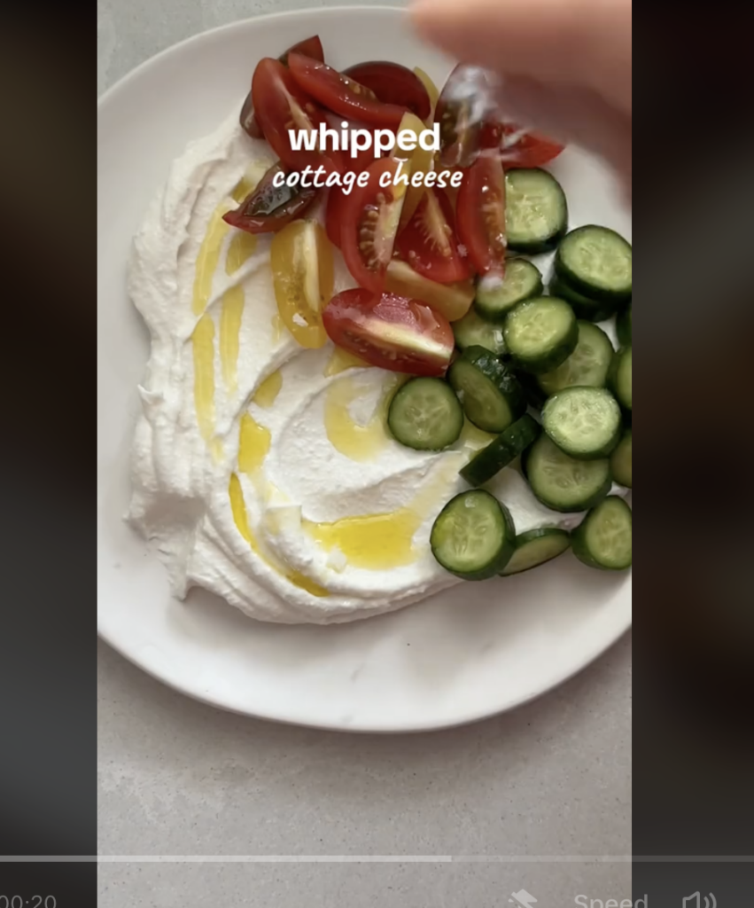 whipped_cottage_cheese_and_vegetables_presented_on_white_plate