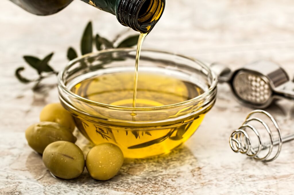 olive_oil_poured_into_glass_bowl
