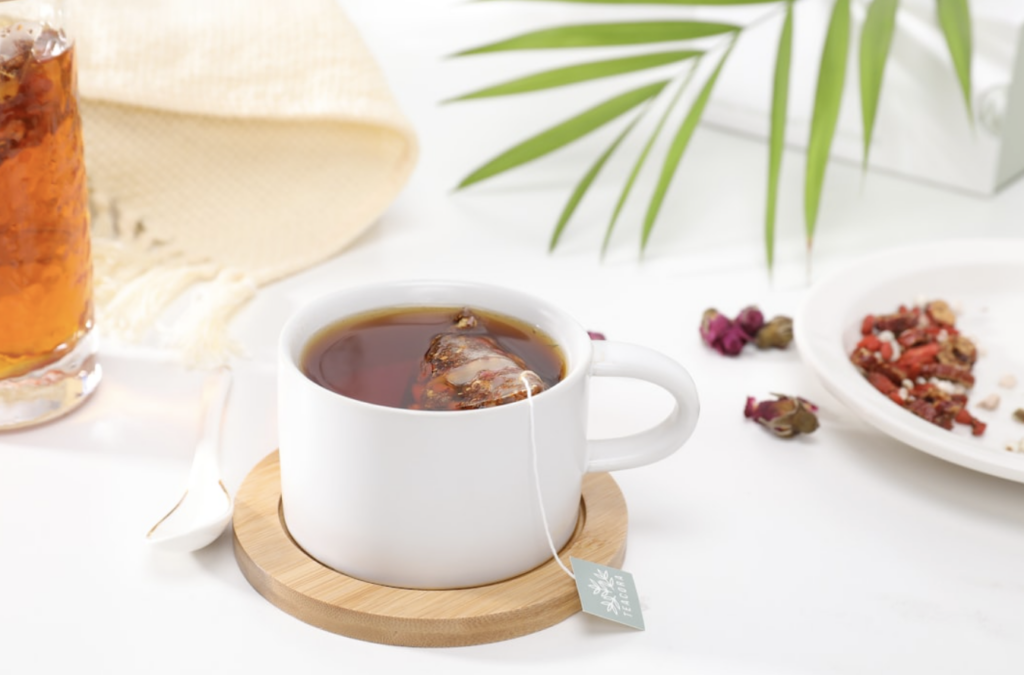 cup_of_tea_on_wooden_coaster