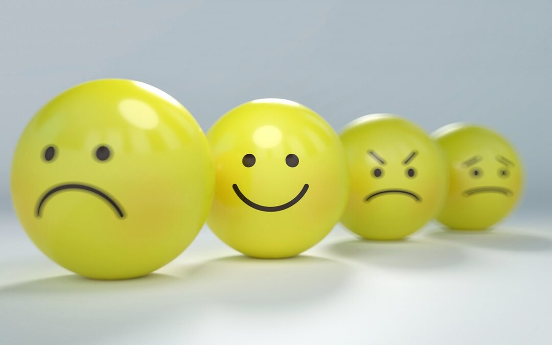 yellow smiley face balls sad, happy, mad, worried