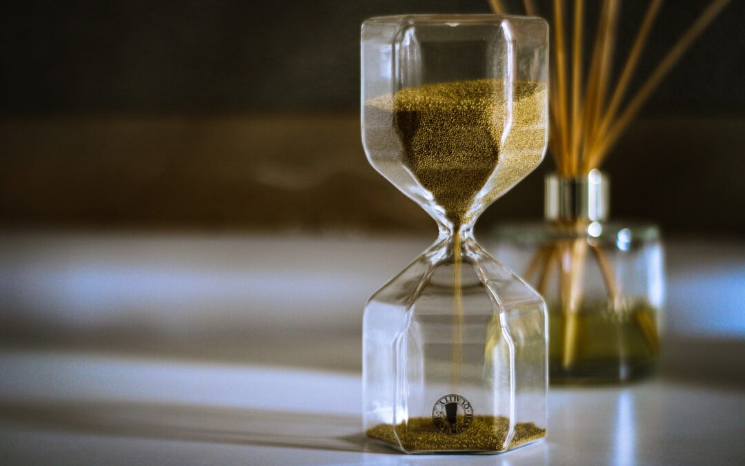 hour glass on table