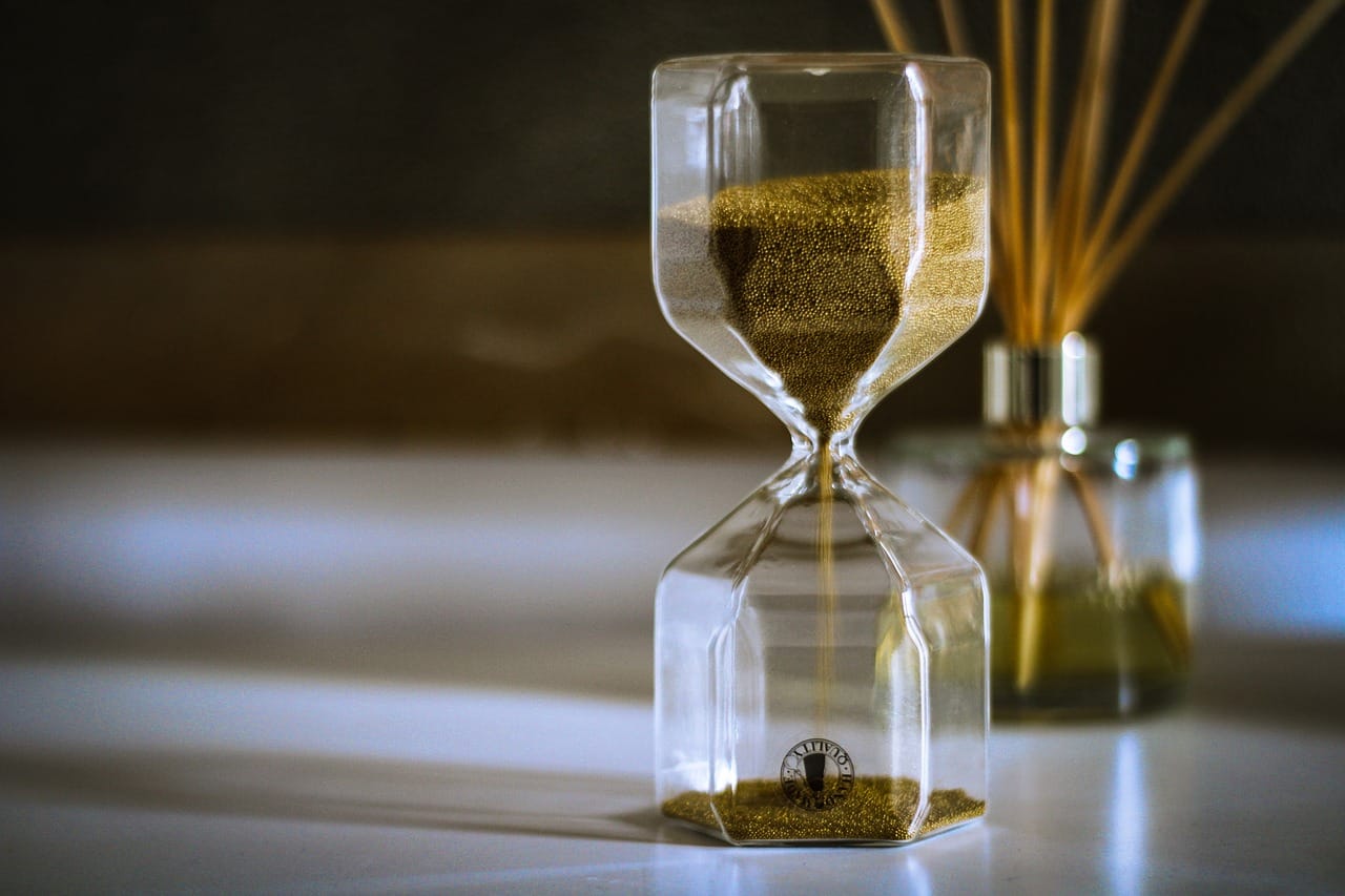 hour glass on table