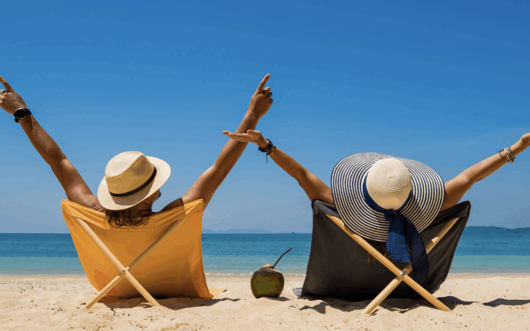 happy couple in beach chairs on the beach