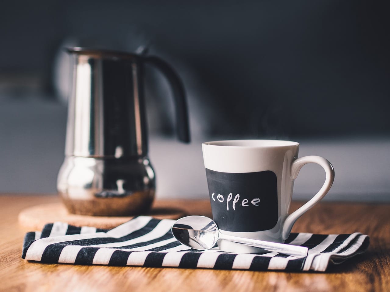 coffee cup and coffee pitcher
